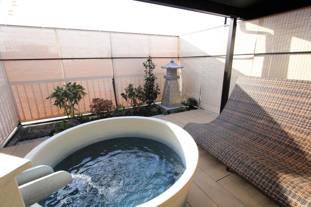 Konjakuso Osaka Tempozan "Ikesu" Projection M Apping Spa Konjakuso Osaka Tempozan "Takadoro" Wheel View Ngoại thất bức ảnh